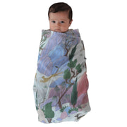 Baby Wrapped in the Mountain Swaddle by The Swaddle Society